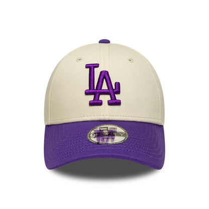 Dodgers Youth MLB League Essential Cream & Purple New Era 9FORTY Adjustable Cap, front view showing the raised purple embroidered LA logo on the cream front panel, with a contrasting purple visor and 9FORTY size sticker prominently displayed.