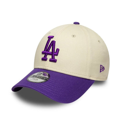 Pictured is this Youth MLB League Essential LA Dodgers 9FORTY cap in cream. 1