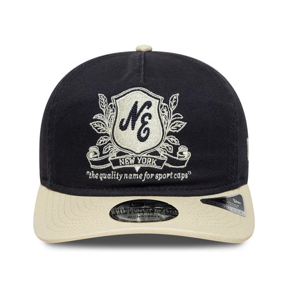 Pictured is this New Era Washed Graphic 19TWENTY cap in navy & cream. 2