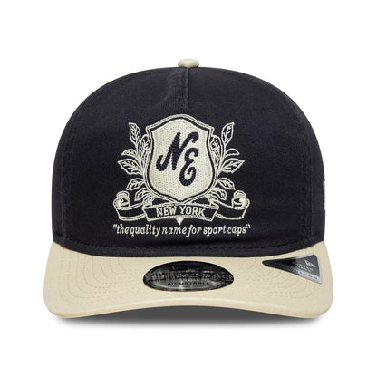 Pictured is this New Era Washed Graphic 19TWENTY cap in navy. 2