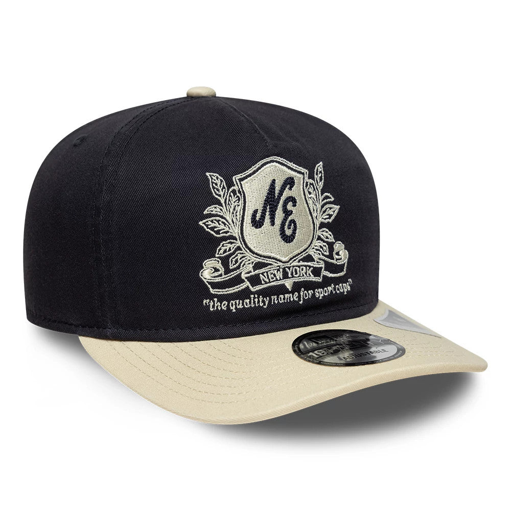 Pictured is this New Era Washed Graphic 19TWENTY cap in navy & cream. 3