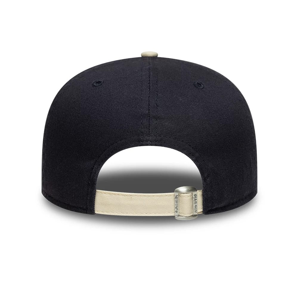 Pictured is this New Era Washed Graphic 19TWENTY cap in navy. 4