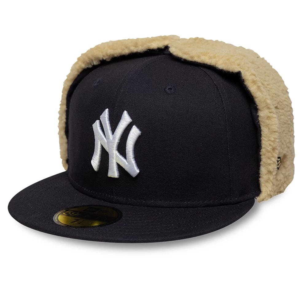 Pictured is this MLB World Series New York Yankees Dogear 59FIFTY Fitted cap in navy. 5
