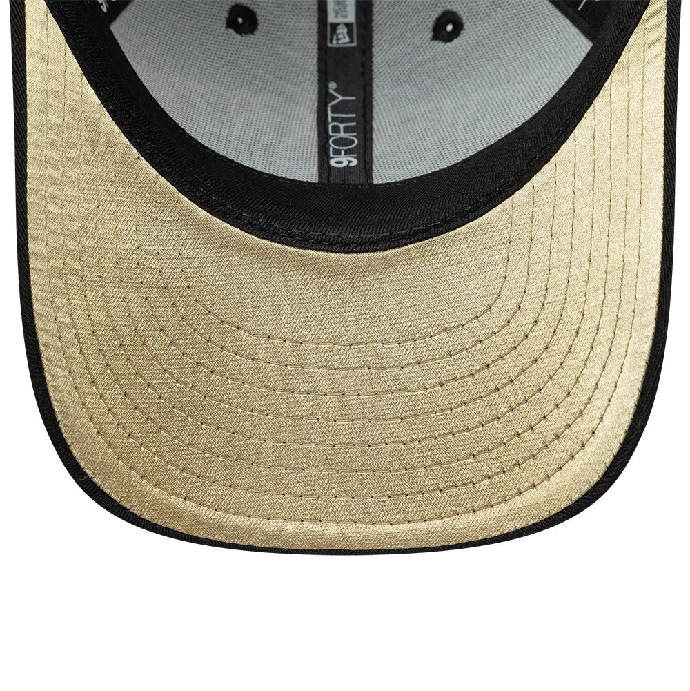 Youth Harry Potter Hogwarts Black New Era 9FORTY Adjustable Cap, inside view showing the light gold undervisor, grey interior panels with black taping featuring the 9FORTY logo, and black sweatband lining the edge of the structured crown.