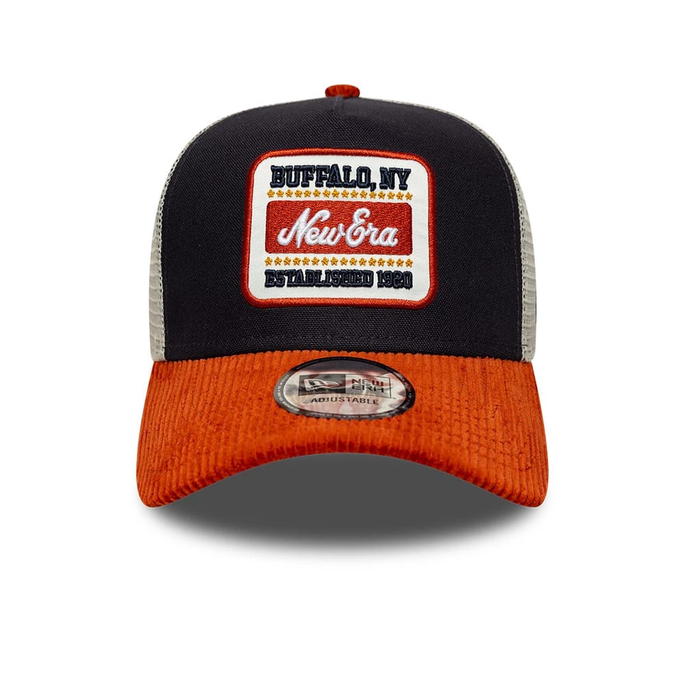 Pictured is this New Era Patch Cord 9FORTY A-Frame Trucker cap in navy & red. 2