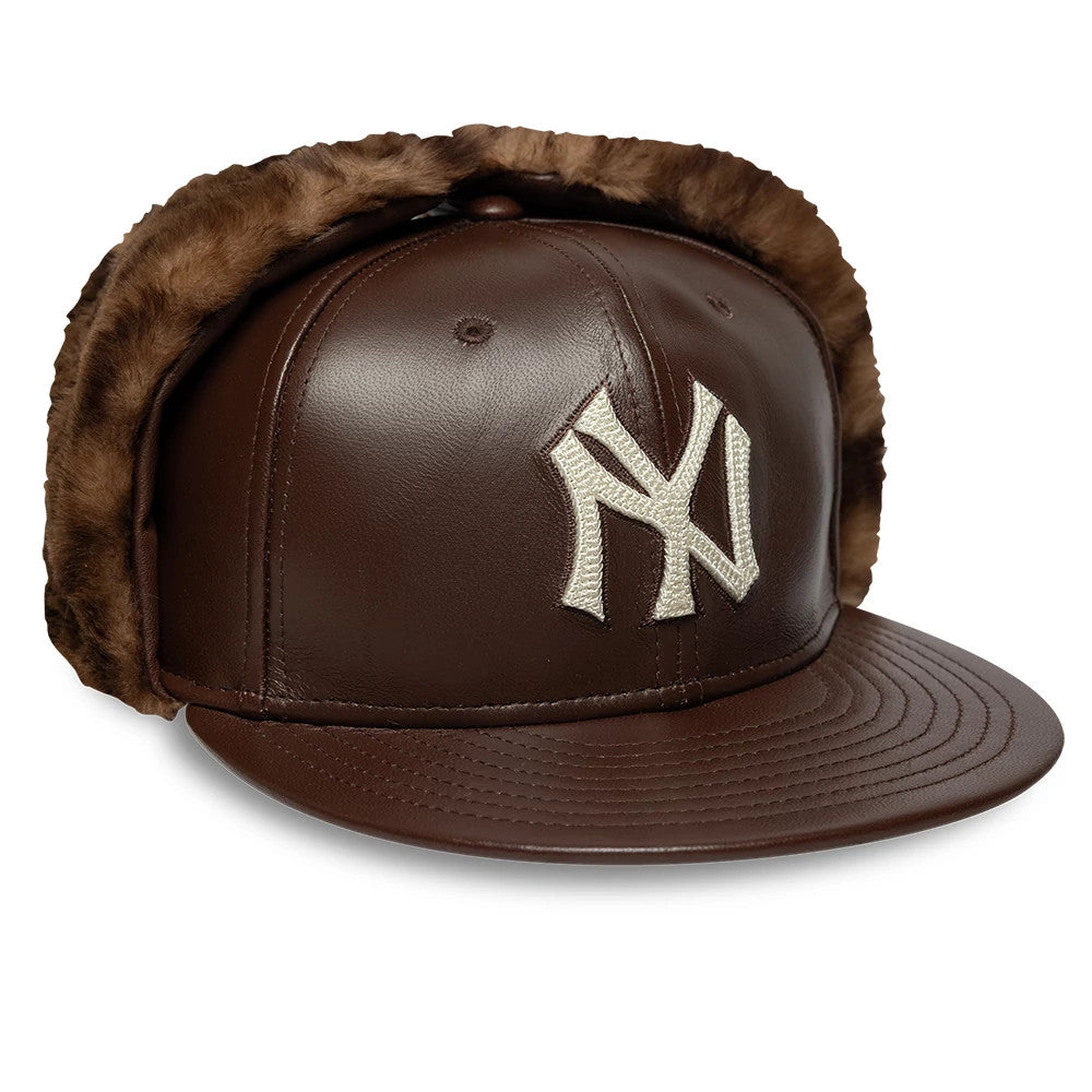 Pictured is this MLB Leather New York Yankees Dogear 59FIFTY Fitted cap in brown. 6