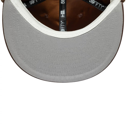 Pictured is this MLB Leather New York Yankees Dogear 59FIFTY Fitted cap in brown. 3