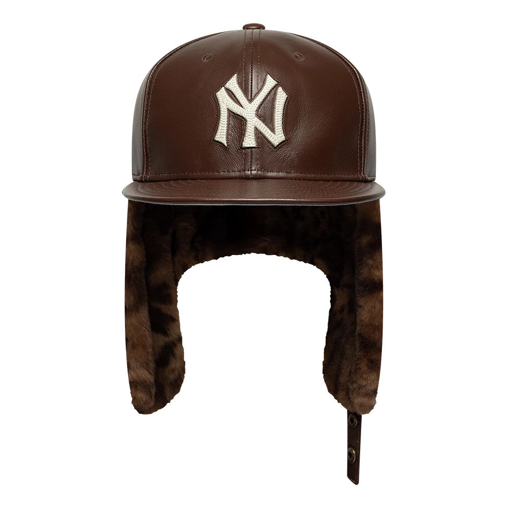Pictured is this MLB Leather New York Yankees Dogear 59FIFTY Fitted cap in brown. 5