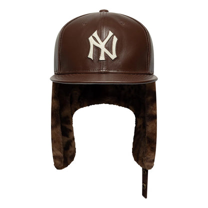Pictured is this MLB Leather New York Yankees Dogear 59FIFTY Fitted cap in brown. 5