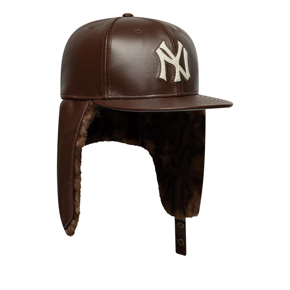 Pictured is this MLB Leather New York Yankees Dogear 59FIFTY Fitted cap in brown. 7