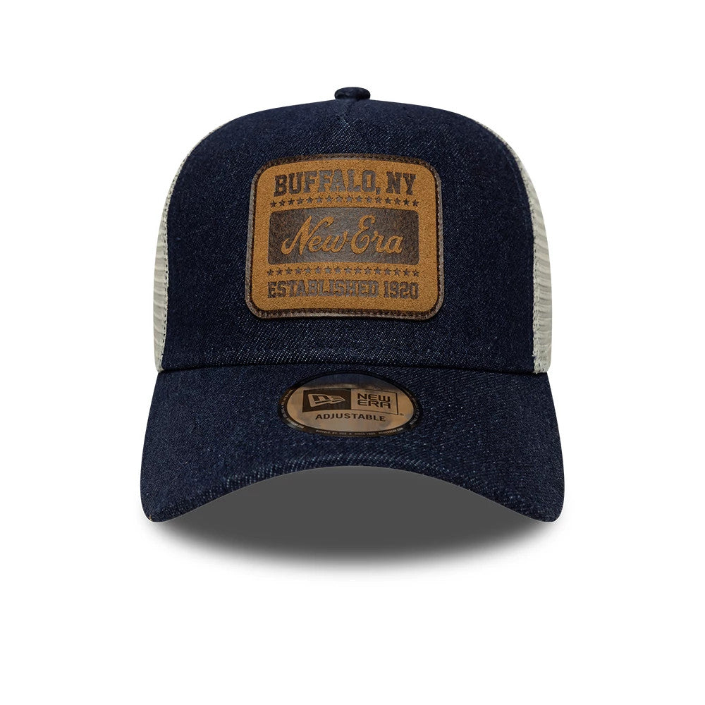 Pictured is this New Era Patch Denim 9FORTY A-Frame Trucker cap in dark blue. 2