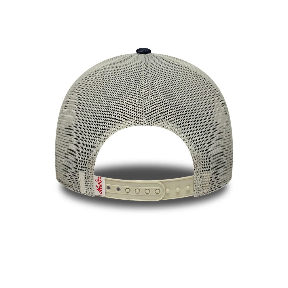 Pictured is this New Era Patch Denim 9FORTY A-Frame Trucker cap in dark blue. 4