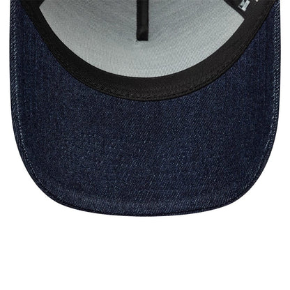 Pictured is this New Era Patch Denim 9FORTY A-Frame Trucker cap in dark blue. 5