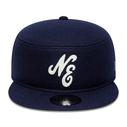 Pictured is this New Era Pin Pillbox Adjustable cap in navy. 2