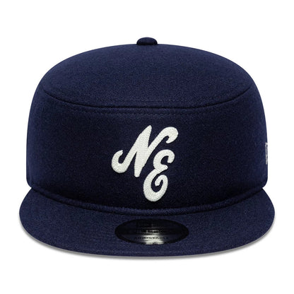 Pictured is this New Era Pin Pillbox Adjustable cap in navy. 2
