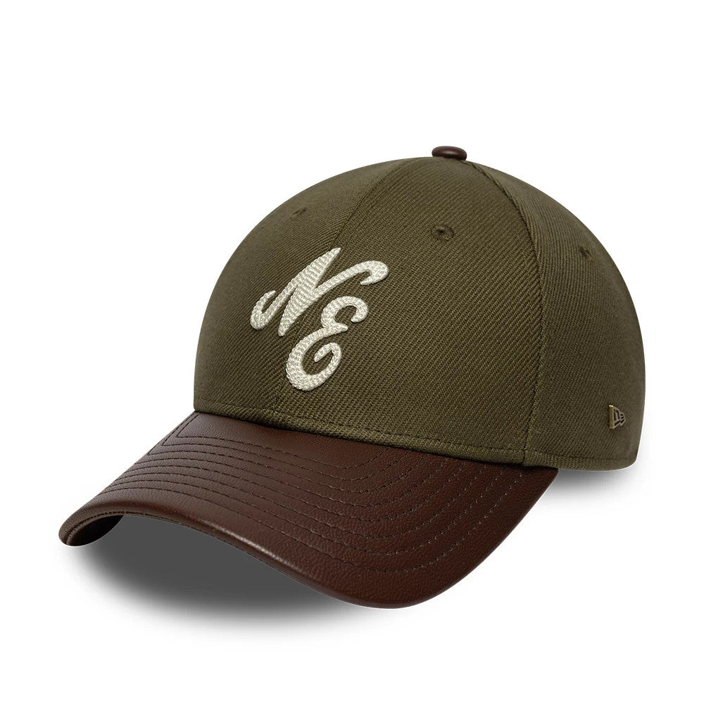 Pictured is this New Era Leather Visor 9FORTY M-Crown cap in dark brown. 1