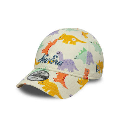 Pictured is this Toddler New Era All Over Dino 9FORTY cap in cream. 1