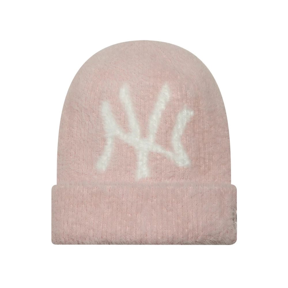 Pictured is this Womens MLB Fluffy Mohair New York Yankees Cuff Knit Beanie hat in pastel pink. 1