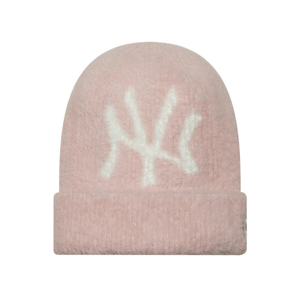 Pictured is this Womens MLB Fluffy Mohair New York Yankees Cuff Knit Beanie hat in pastel pink. 1
