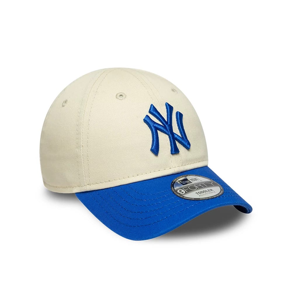 Pictured is this Toddler MLB League Essential New York Yankees 9FORTY cap in cream. 3