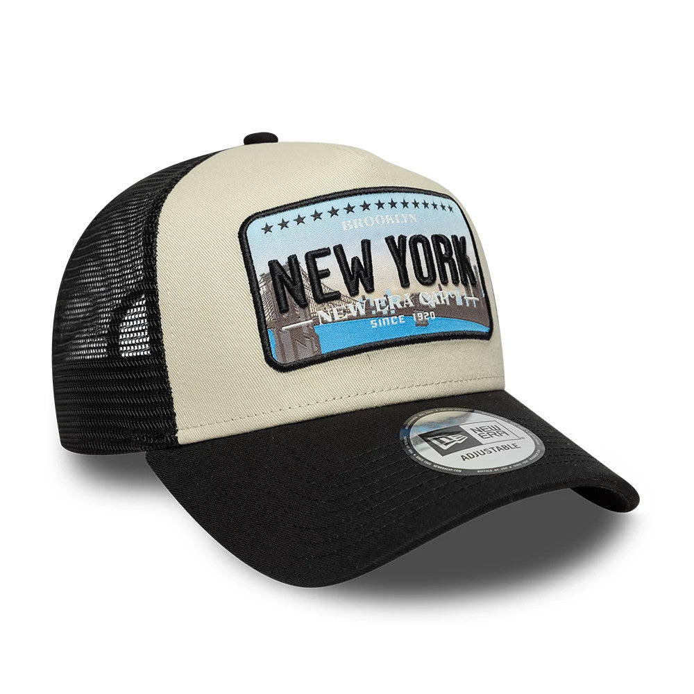Pictured is this New Era Licence Plate 9FORTY A-Frame Trucker cap in black. 3