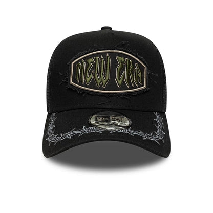 Pictured is this New Era Distressed Patch 9FORTY E-Frame Trucker cap in black. 2