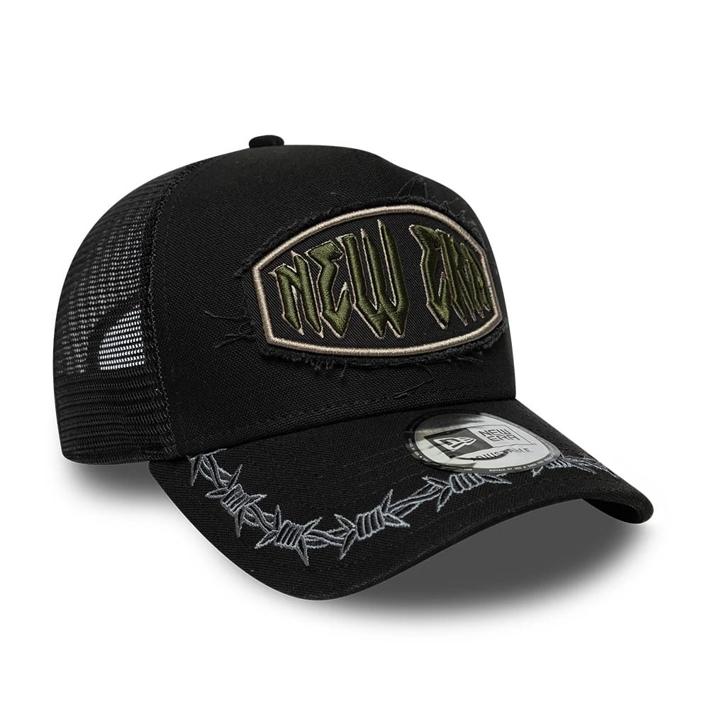 Pictured is this New Era Distressed Patch 9FORTY E-Frame Trucker cap in black. 3