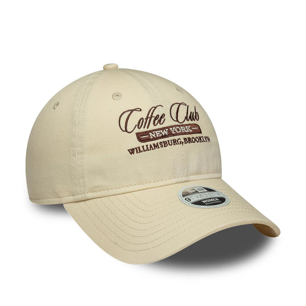 Pictured is this Womens New Era Café Slogan 9TWENTY cap in cream. 3