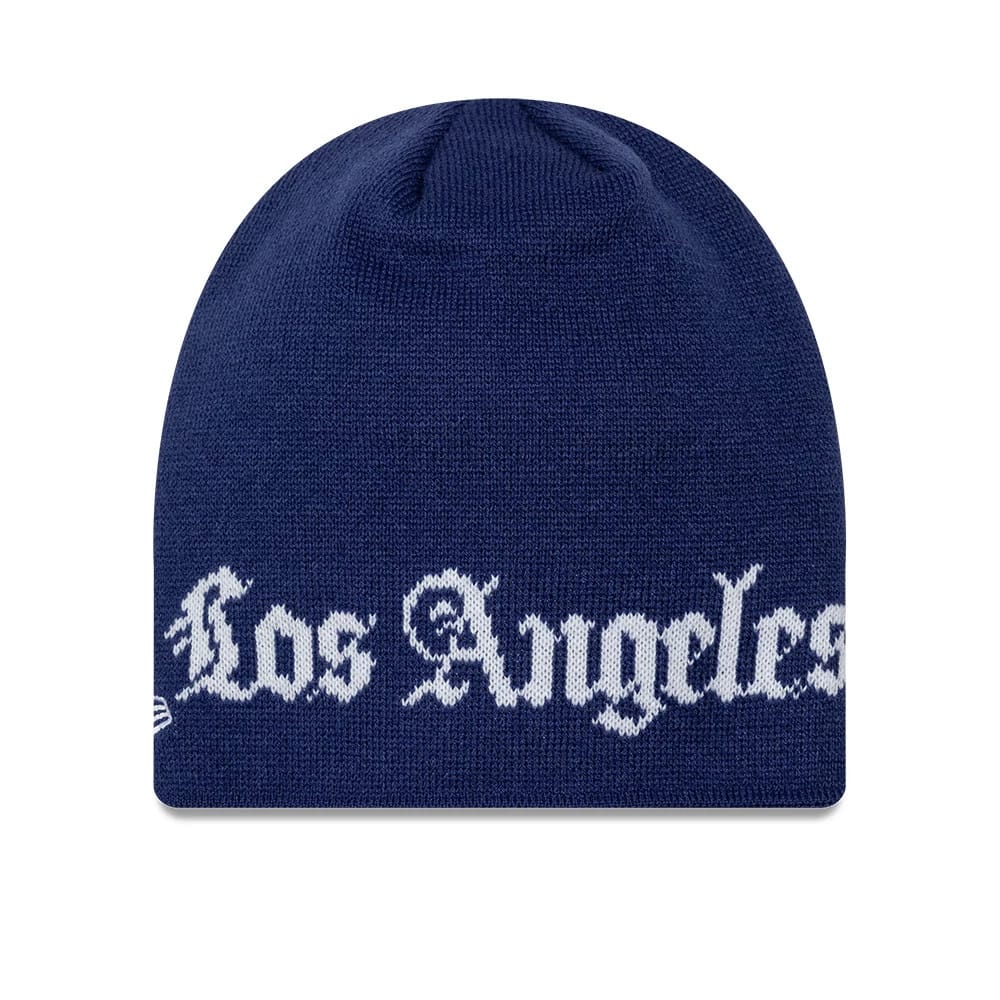Pictured is this MLB Script LA Dodgers Skull Knit Beanie hat in dark blue. 2