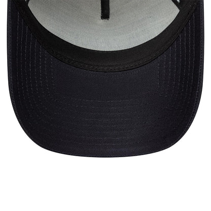 New Era Cali Licence Plate Navy 9FORTY A-Frame Trucker Adjustable Cap, inside view showing a grey sweatband, black undervisor, and contrasting internal taping, highlighting the structured design of the navy cap's crown.