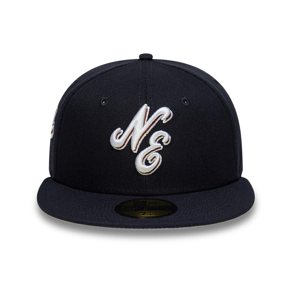 Pictured is this New Era Heritage Script 59FIFTY Fitted cap in navy. 4