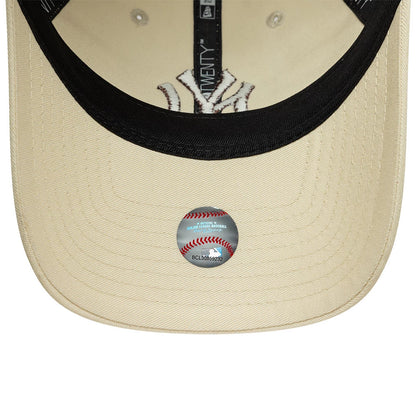 Pictured is this MLB League Essential New York Yankees 9TWENTY cap in cream. 5