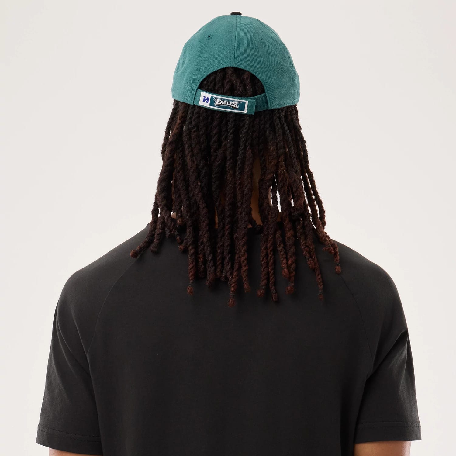 The model is wearing this NFL Sideline 2026 Philadelphia Eagles T-Shirt in black. 7