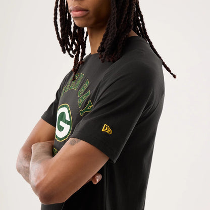 The model is wearing this NFL Sideline 2026 Green Bay Packers T-Shirt in black. 6