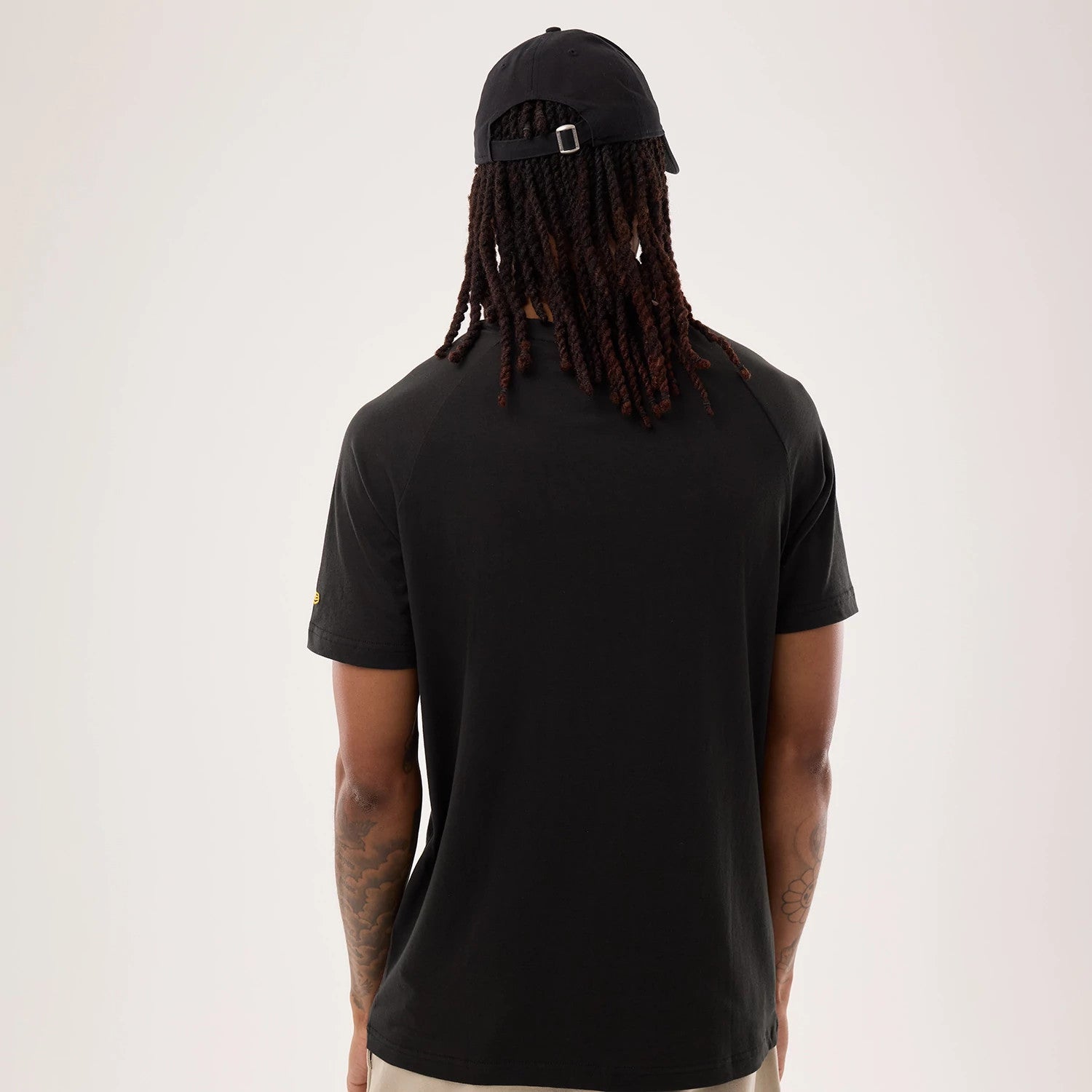 The model is wearing this NFL Sideline 2026 Pittsburgh Steelers T-Shirt in black. 2