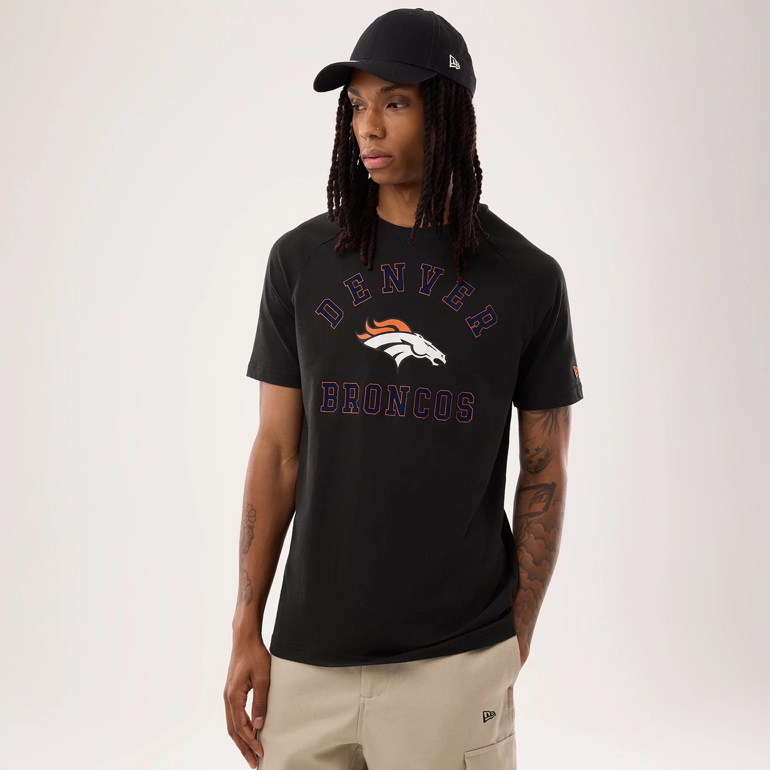 The model is wearing this NFL Sideline 2026 Denver Broncos T-Shirt in black. 1