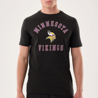 The model is wearing this NFL Sideline 2026 Minnesota Vikings T-Shirt in black. 4
