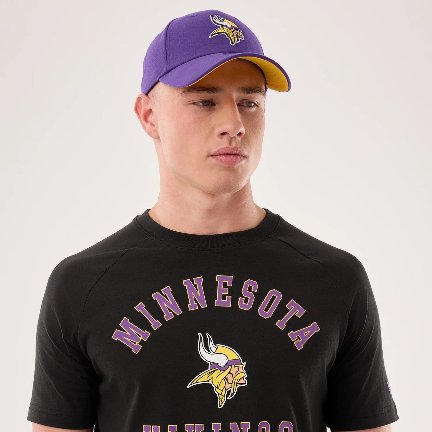 The model is wearing this NFL Sideline 2026 Minnesota Vikings T-Shirt in black. 5