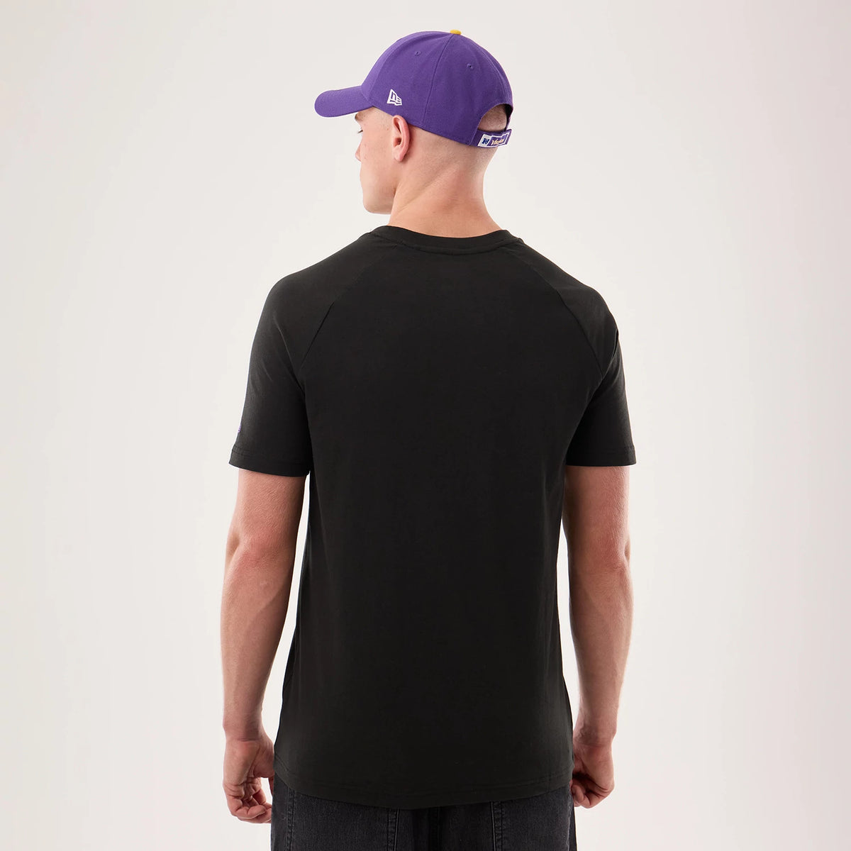 The model is wearing this NFL Sideline 2026 Minnesota Vikings T-Shirt in black. 2