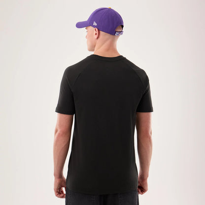 The model is wearing this NFL Sideline 2026 Minnesota Vikings T-Shirt in black. 2
