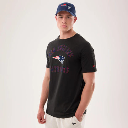 The model is wearing this NFL Sideline 2026 New England Patriots T-Shirt in black. 1