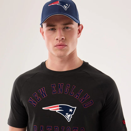 The model is wearing this NFL Sideline 2026 New England Patriots T-Shirt in black. 6