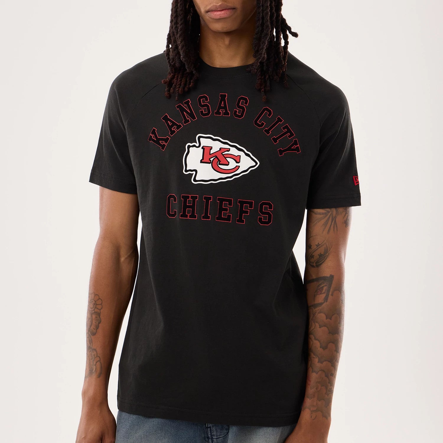 The model is wearing this NFL Sideline 2026 Kansas City Chiefs T-Shirt in black. 3