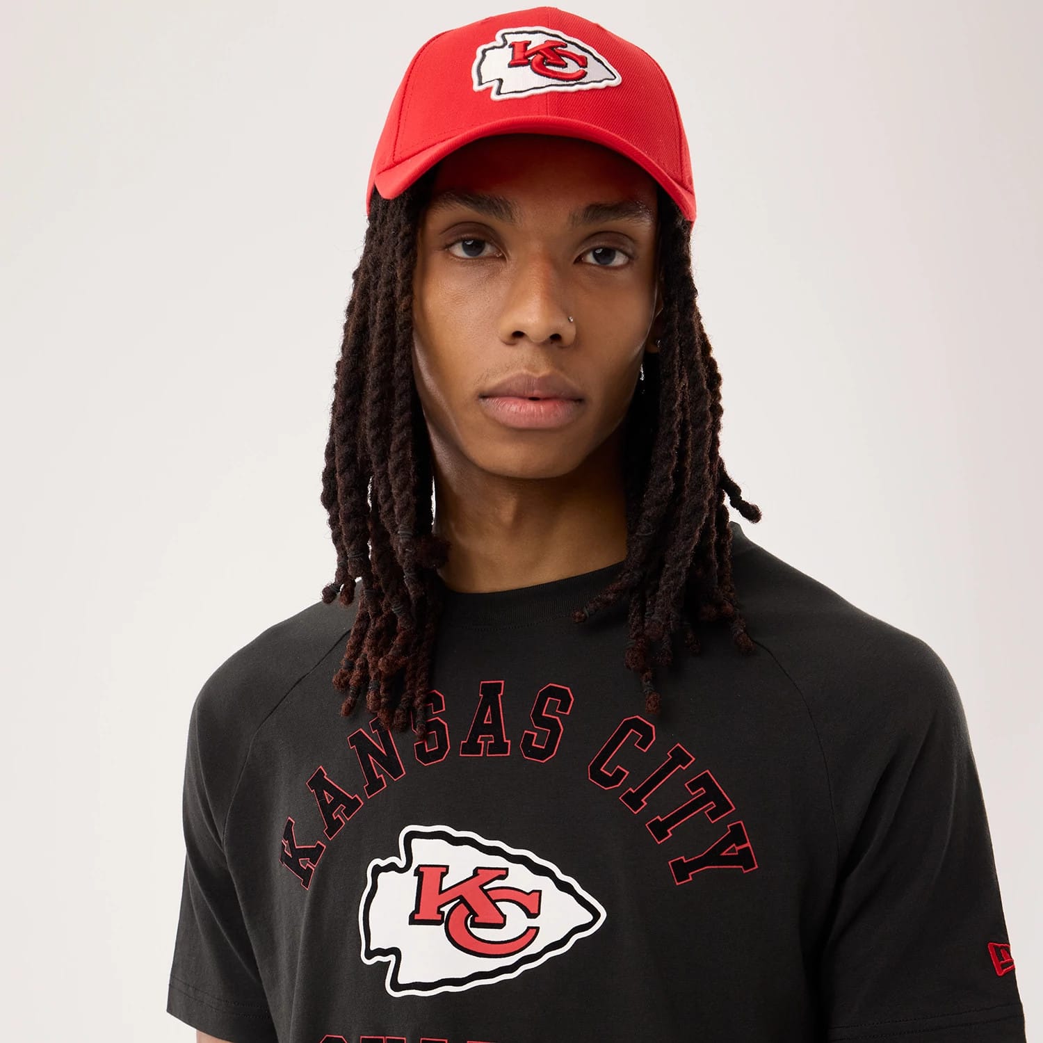 The model is wearing this NFL Sideline 2026 Kansas City Chiefs T-Shirt in black. 6