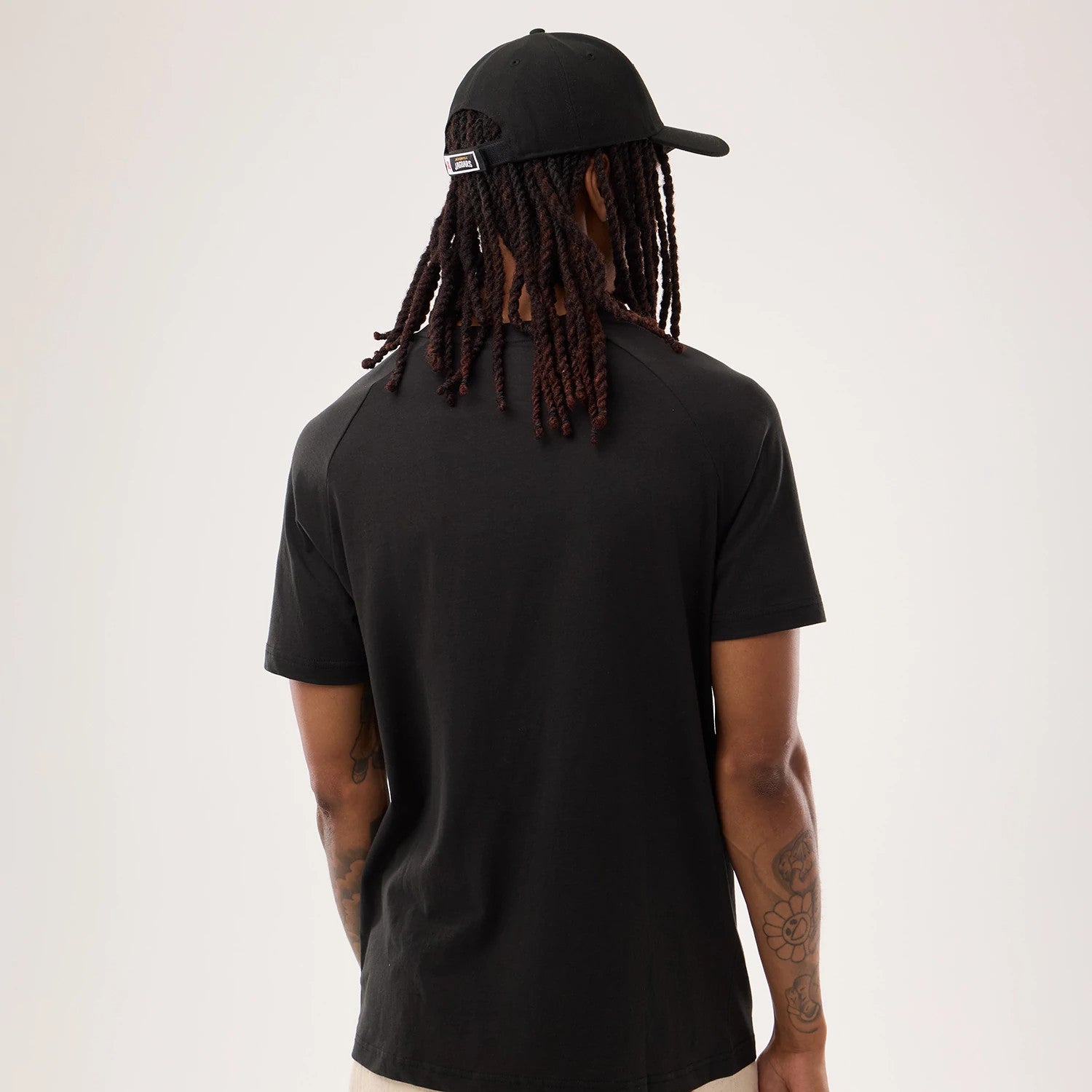 The model is wearing this NFL Sideline 2026 Jacksonville Jaguars T-Shirt in black. 2