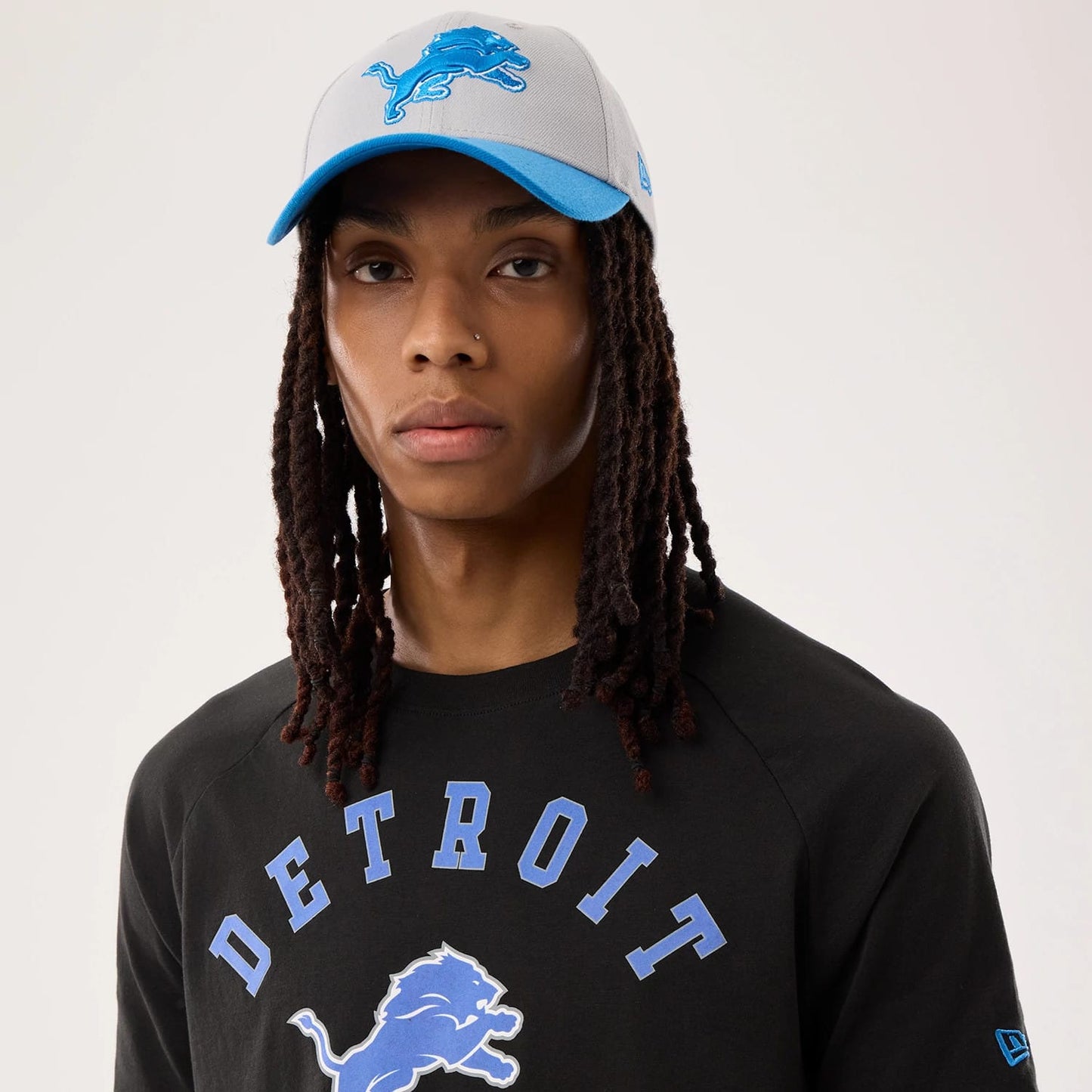 The model is wearing this NFL Sideline 2026 Detroit Lions T-Shirt in black. 6
