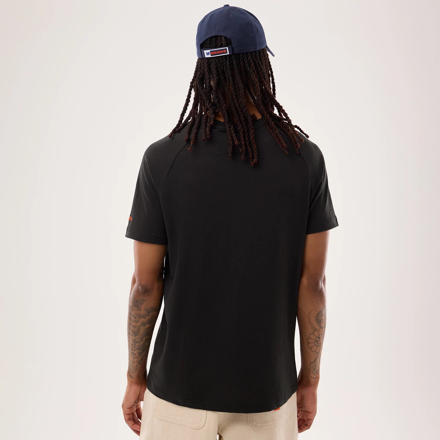 The model is wearing this NFL Sideline 2026 Chicago Bears T-Shirt in black. 2