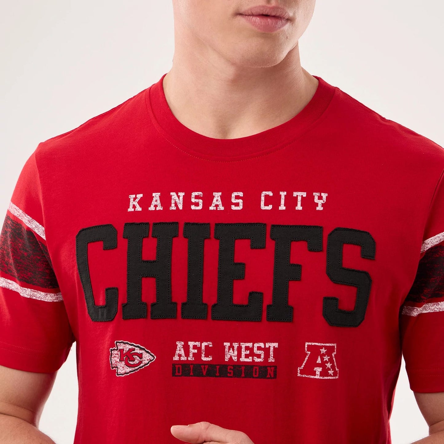 The model is wearing this NFL Sideline 2026 Kansas City Chiefs T-Shirt in red. 3
