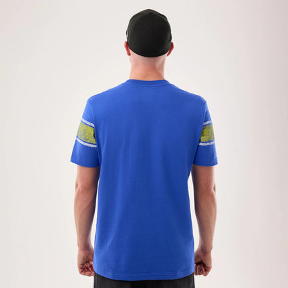 The model is wearing this NFL Sideline 2026 LA Rams T-Shirt in bright blue. 2