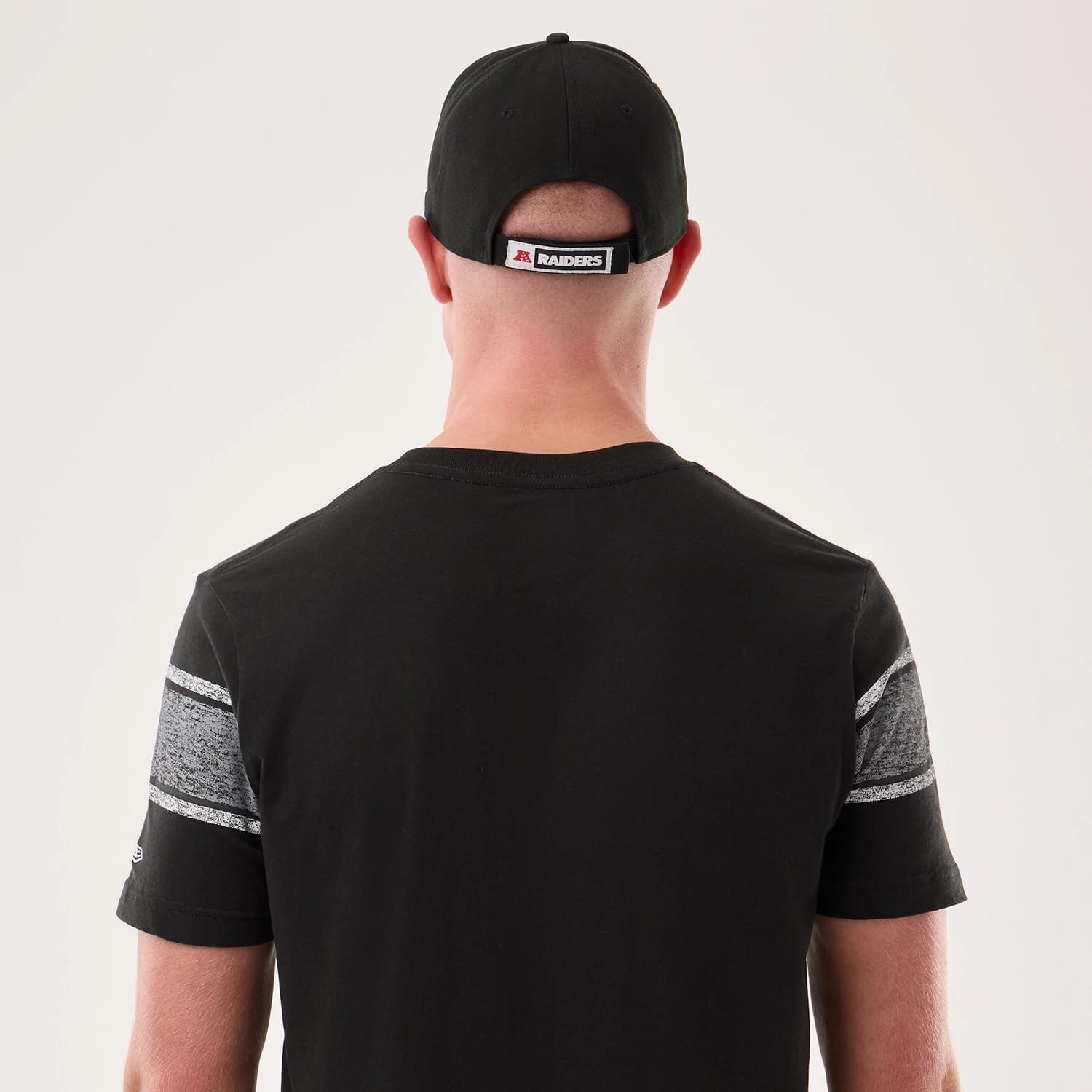 The model is wearing this NFL Sideline 2026 Las Vegas Raiders T-Shirt in black. 5
